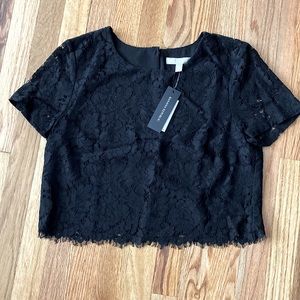 Black lace short sleeve blouse with fringed bottom